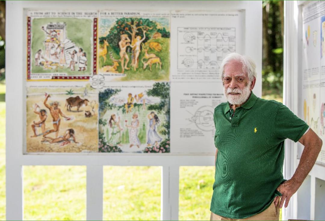 Dr. Albert Levis in Front of Art Work